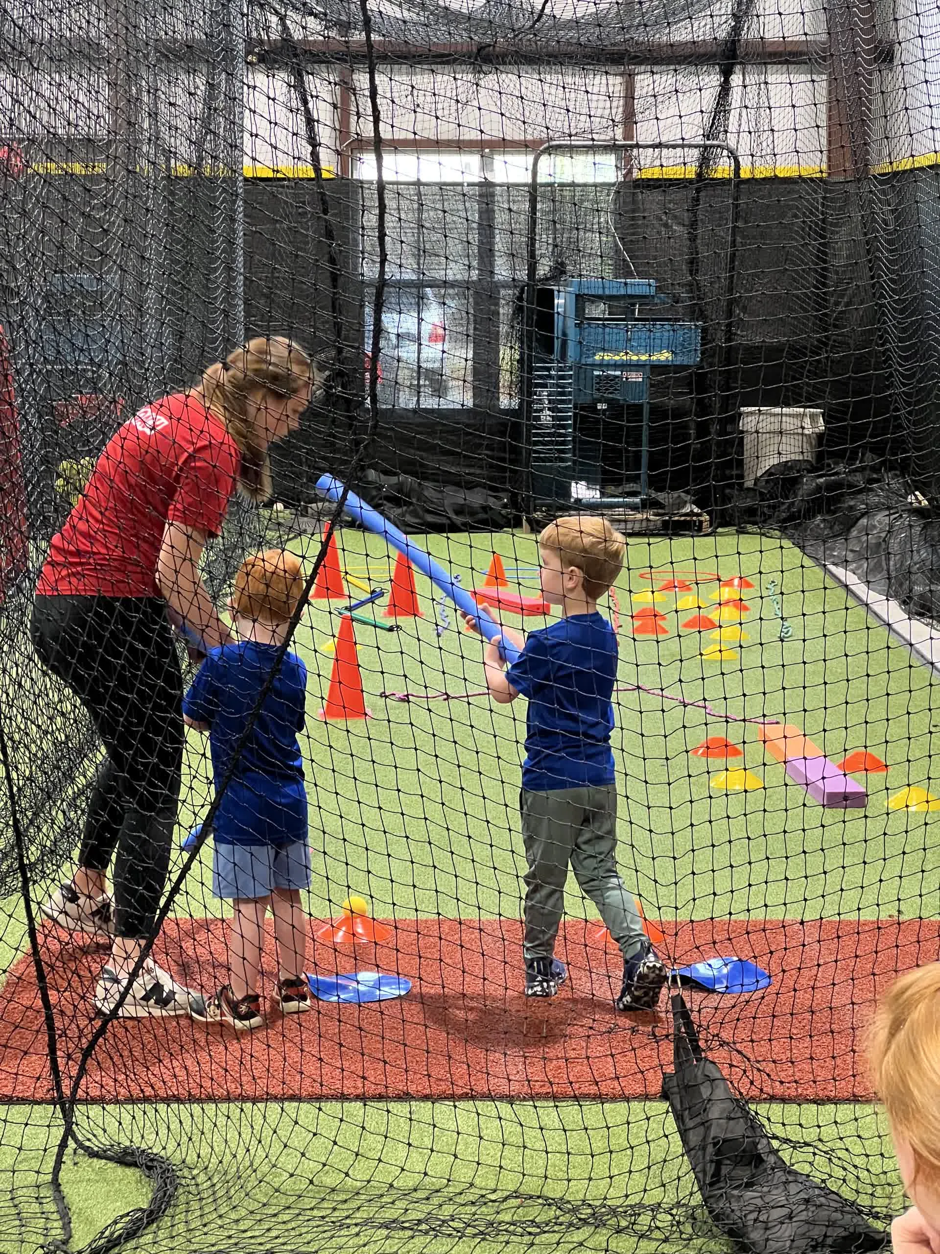 Soccer Stars coach working with a young player